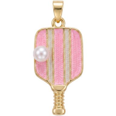 Pink brass pickleball paddle charm pendant with jump ring shown in natural lifestyle light