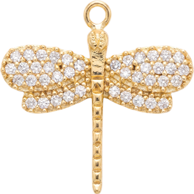 Dragonfly charm pendant gold plated brass with clear zircons on soft natural background