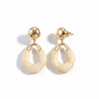 Cream marble gold hoop drop earrings with brass ball stud and push-back backing on clean neutral surface