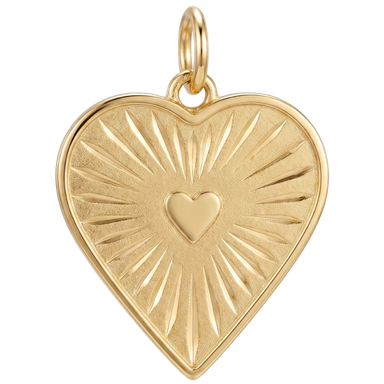 Heart sunburst engraved gold brass charm pendant with jump ring on clean white surface