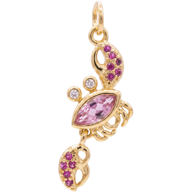 Gold plated pink baby crab charm pendant on white background