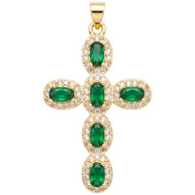 Gold plated cross charm pendant with green oval zircons and white halo glowing in natural light
