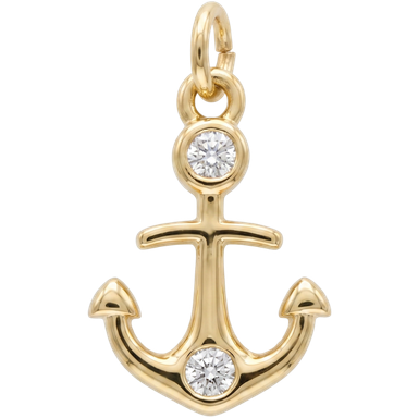Gold plated brass anchor charm pendant with two clear zircons on white background close-up view