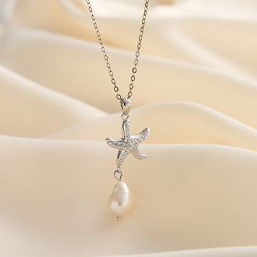 Starfish pearl necklaces displayed in silver.