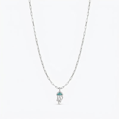 Drift Deep jellyfish pendant necklace sterling silver teal stone white zircon halo close view