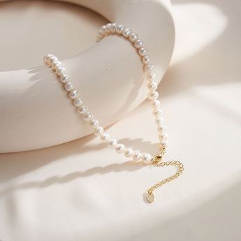 14K gold clasp on freshwater pearl necklace.