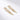 Gold-tone brass clear zircon long drop earrings warm light lifestyle close-up