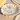 Shell-shaped jewelry dish with Horizon Kiss Rings on a natural sunlight
