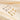 Gold and silver PRASINOUS shell earrings side by side.
