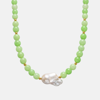 Green jade bead necklace with baroque pearl pendant on white background