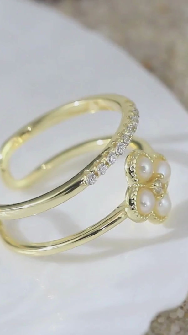Close-up of PRASINOUS adjustable pearl ring with CZ accents.