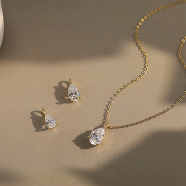 All sizes of view for pear cut CZ pendant in 14K gold setting.