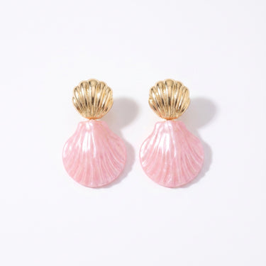 Drop earrings with gold metal shell studs and pearlescent pink resin shell pendants on white background