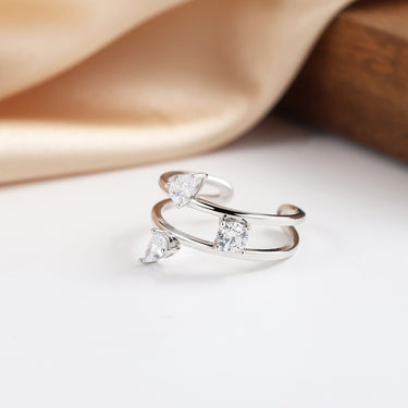 Silver version of Trio Crystal Ring with three cubic zirconia stones on white surface.